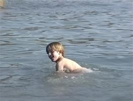 Matthew John finally plucks up courage to take a dip in the icy waters at Hemmick Beach, Boswinger